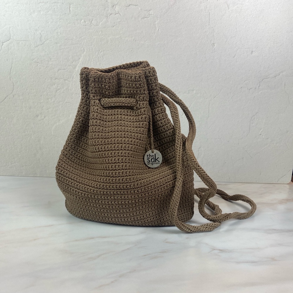 The Sak Crochet Drawstring Backpack in Brown